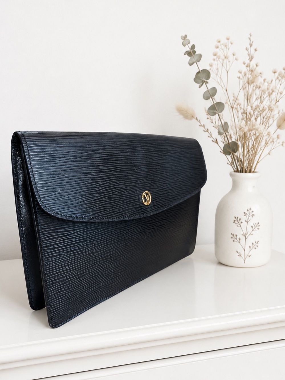 Louis Vuitton Elegant Classic Black Leather Clutch with Gold LV Button 10x7”